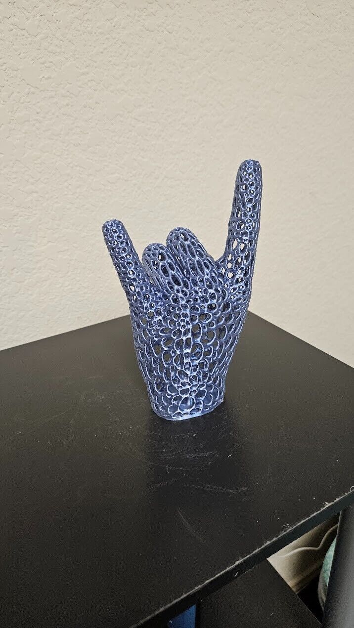 Perfect gift for the heavy metal fan! Lets rock hand sign-shimmering silver blue