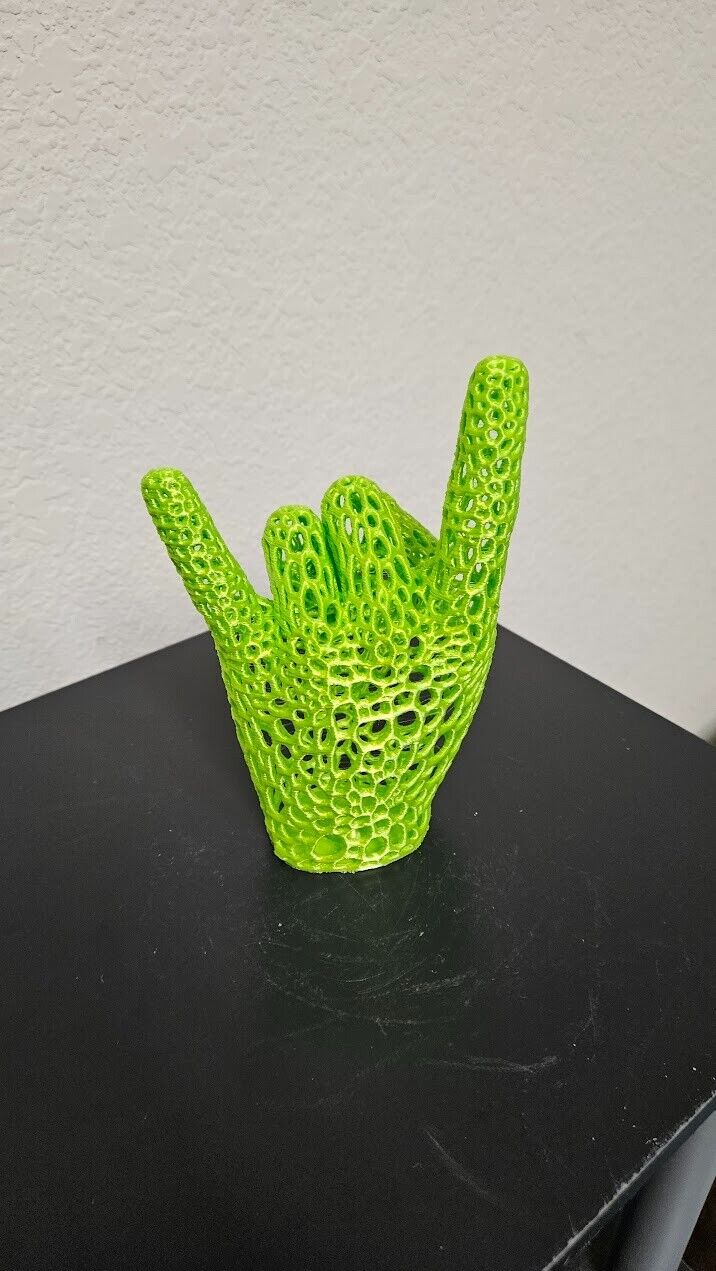 Perfect gift for the heavy metal fan! Lets rock hand sign-shimmering lime green