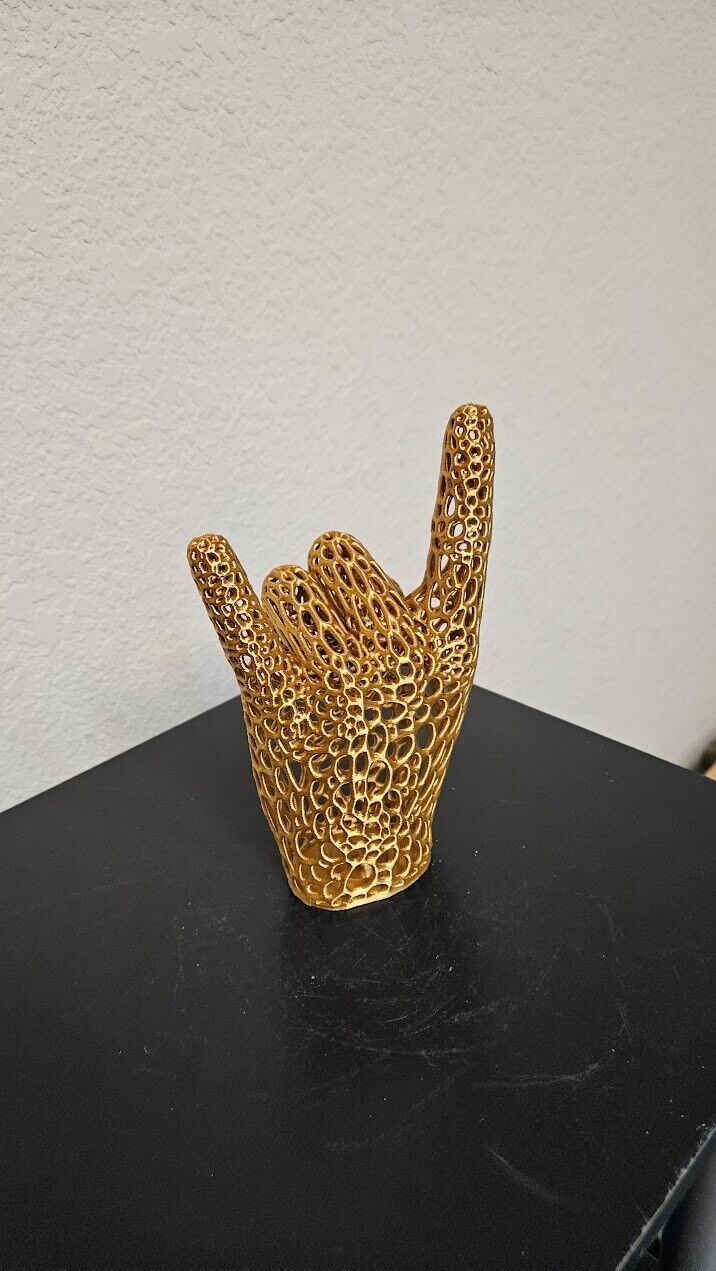 Perfect gift for the heavy metal fan! Lets rock hand sign- shimmering gold color