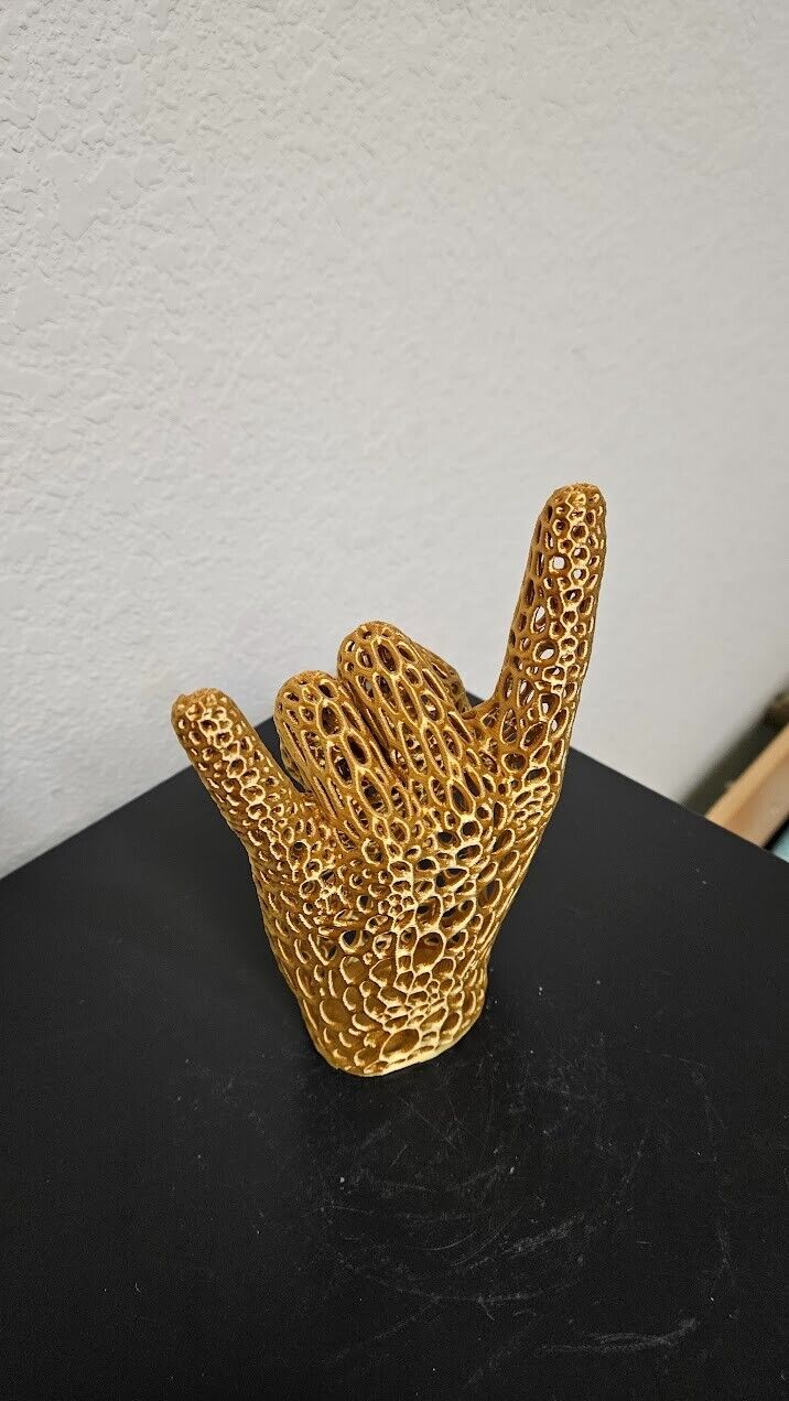 Perfect gift for the heavy metal fan! Lets rock hand sign- shimmering gold color