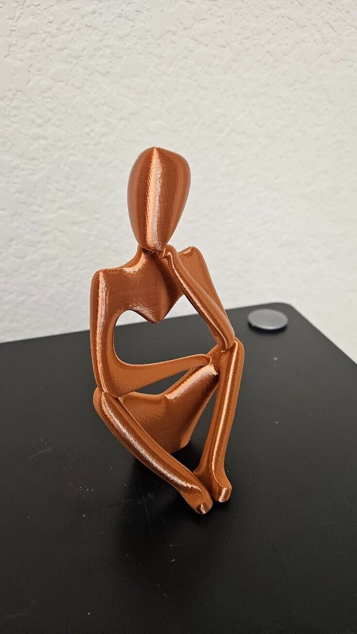 Thinking man statue - shimmering copper color - 7 inches height