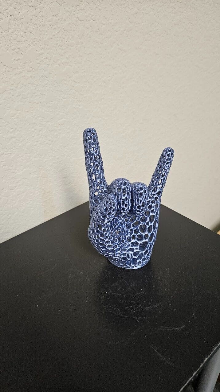 Perfect gift for the heavy metal fan! Lets rock hand sign-shimmering silver blue