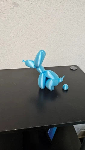 Pooping Balloon Dog 6 inches statue - Shimmering baby blue color