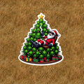 Santa Claus getting high on the Christmas Tree vinyl sticker - several sizes