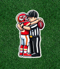 Referee hugging a Chiefs player 100% waterproof vinyl sticker - several sizes